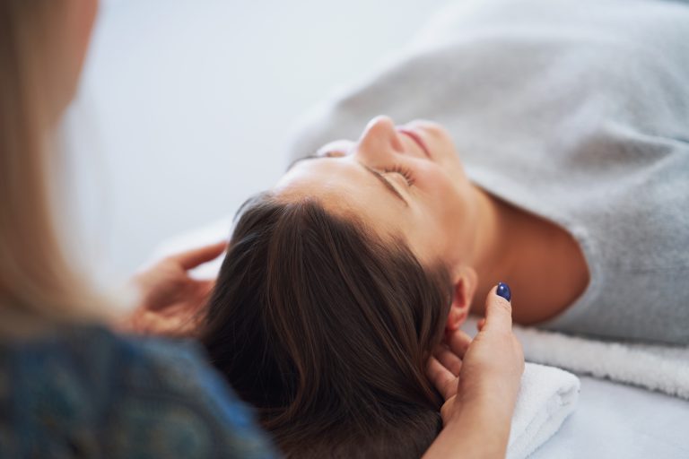 Picture of an treatment that involves gently touching 32 points on your head. High quality photo