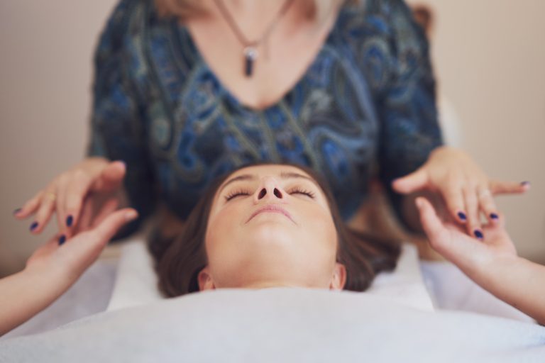 Picture of an treatment that involves gently touching 32 points on your head. High quality photo